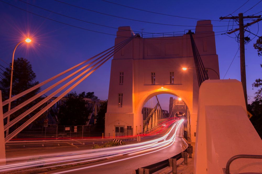 A Bridge with A Lot of Lights on It at Night — Betta Foot Clinic in Calamvale, QLD