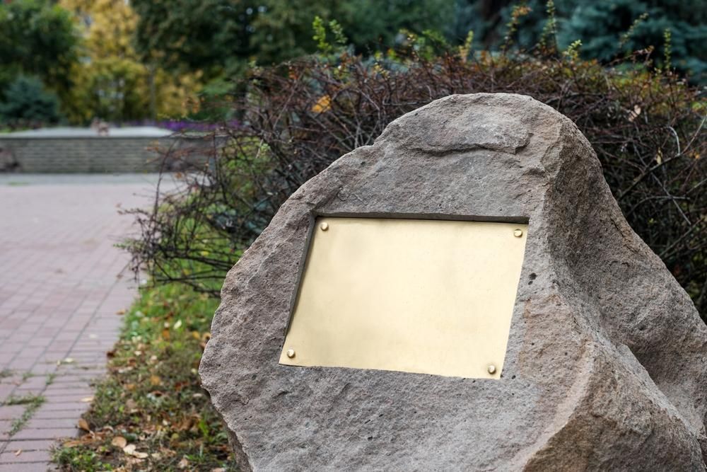 A Large Rock with A Plaque on It in A Park — Nick Locke Monuments in Bellingen, NSW