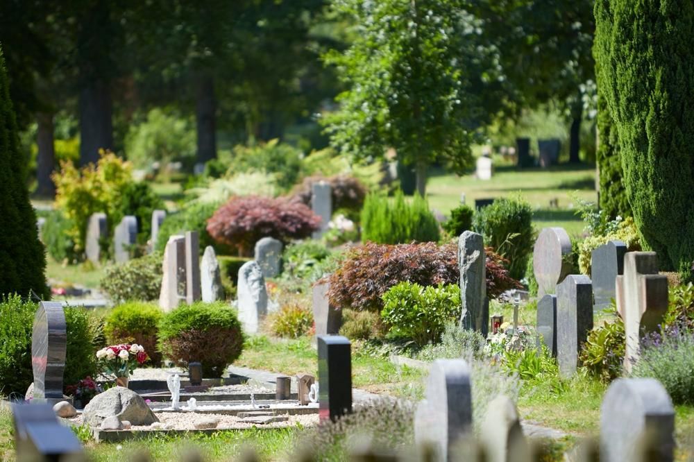 A Cemetery Filled with Lots of Graves and Trees — Nick Locke Monuments in Woolgoolga, NSW