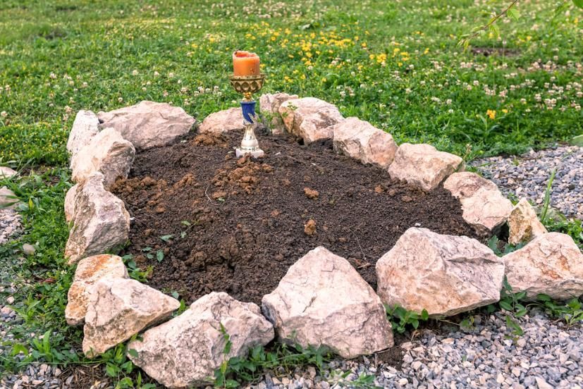 There Is a Candle in The Middle of A Rock Garden — Nick Locke Monuments in Woolgoolga, NSW
