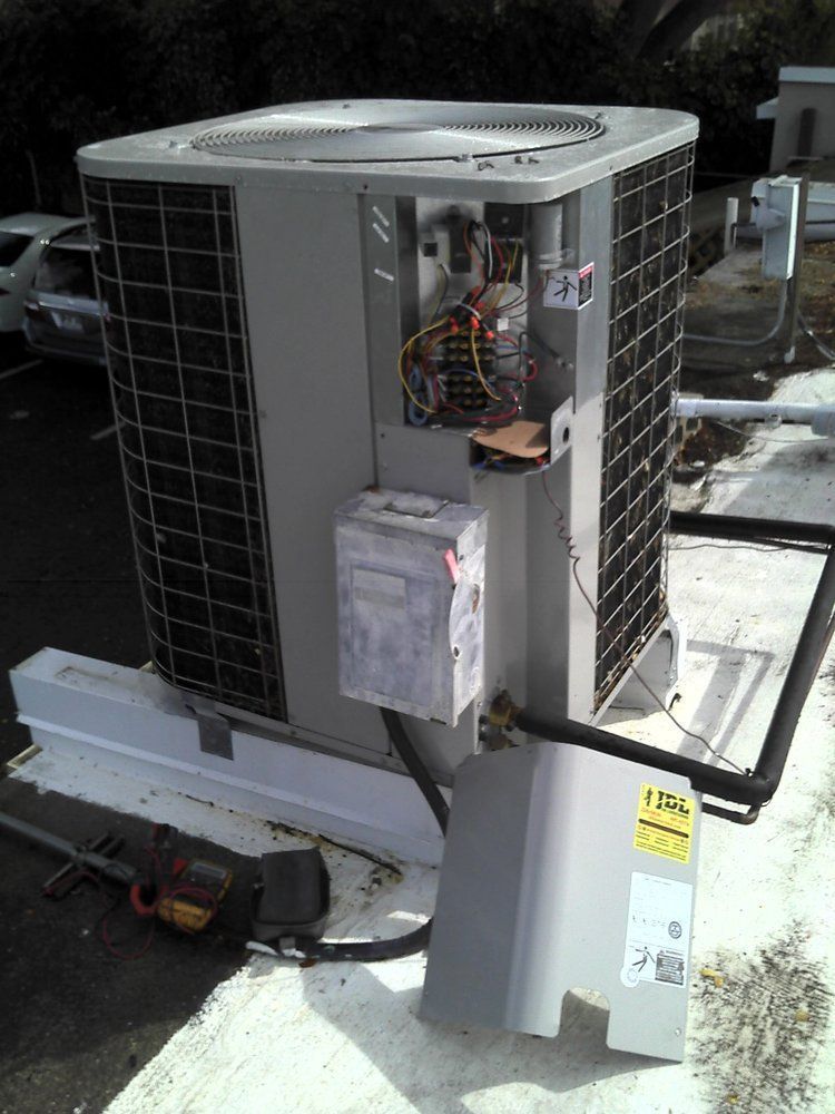 A large air conditioner under maintenance.
