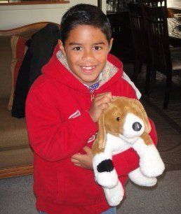 young boy with Beagle toy