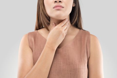 Head And Neck Surgery — Woman Experiencing Sore Throat in San Diego, CA