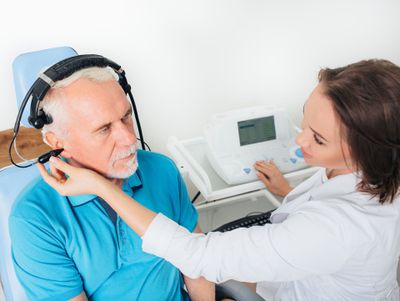 Medical Care For Ear — Senior Having Ear Test in San Diego, CA