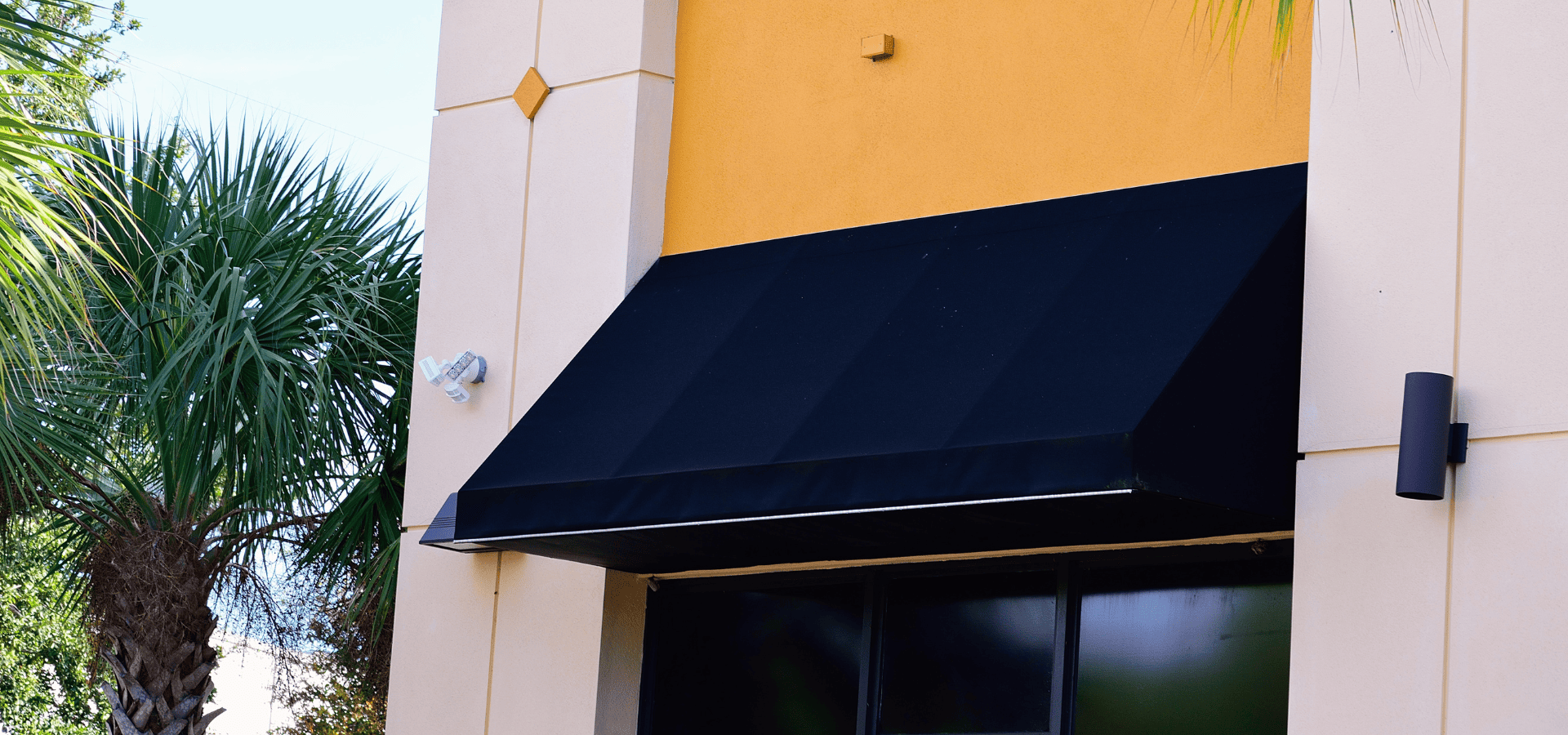 A dark blue awning at a country club in Singapore