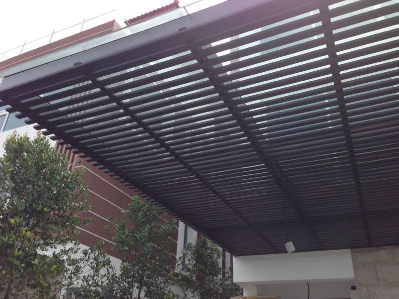 A stationary awning installed by Uni Shades in a landed property in Singapore