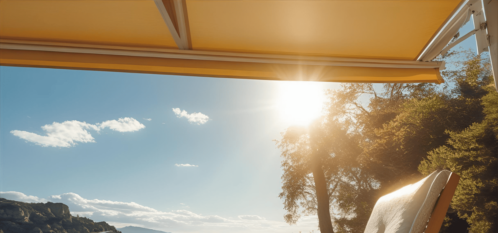 Glaring sunlight on a UV-resistant yellow retractable awning