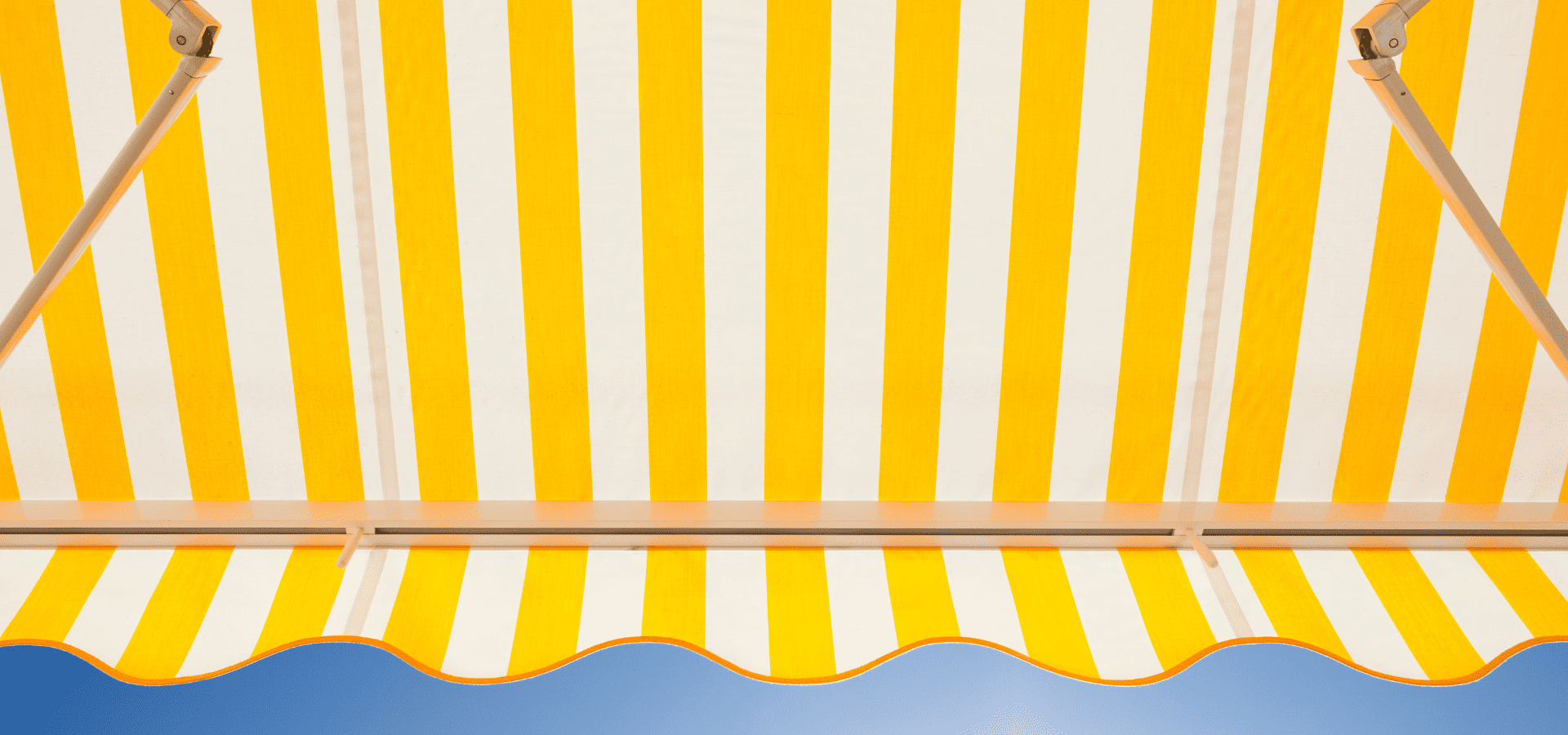 Yellow striped retractable awning in Singapore