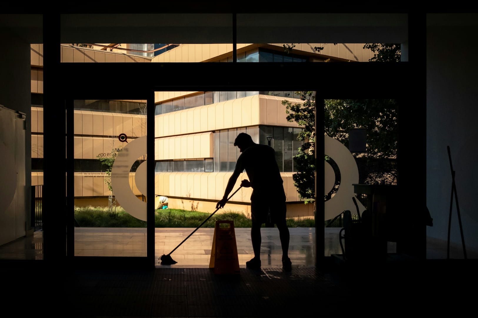 Observing Surveillance Monitors, a Security Personnel in Uniform Ensures Heightened Security — Cleaning & Security in North Queensland