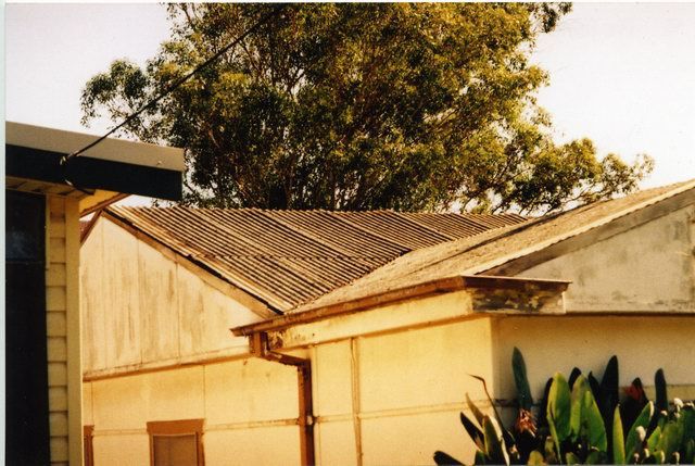 asbestos to metal roof before