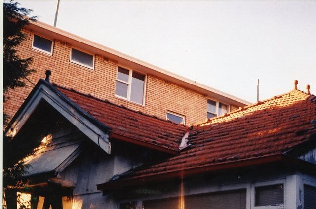 tile to metal roof and gutters before