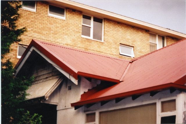 tile to metal roof and gutters after