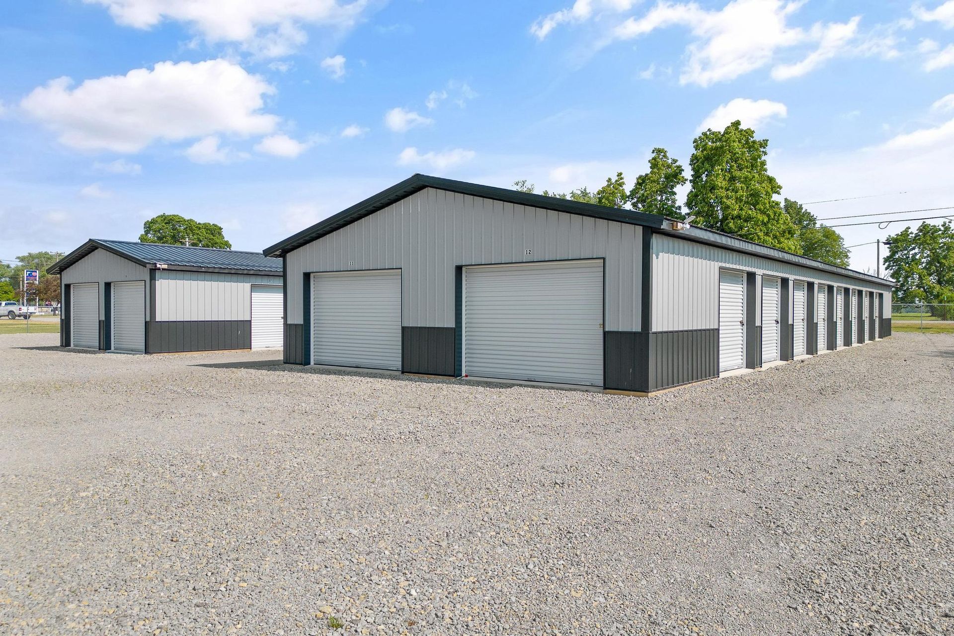 A man is working on a piece of metal in a workshop.