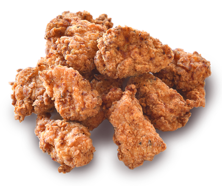 A pile of fried chicken on a white background
