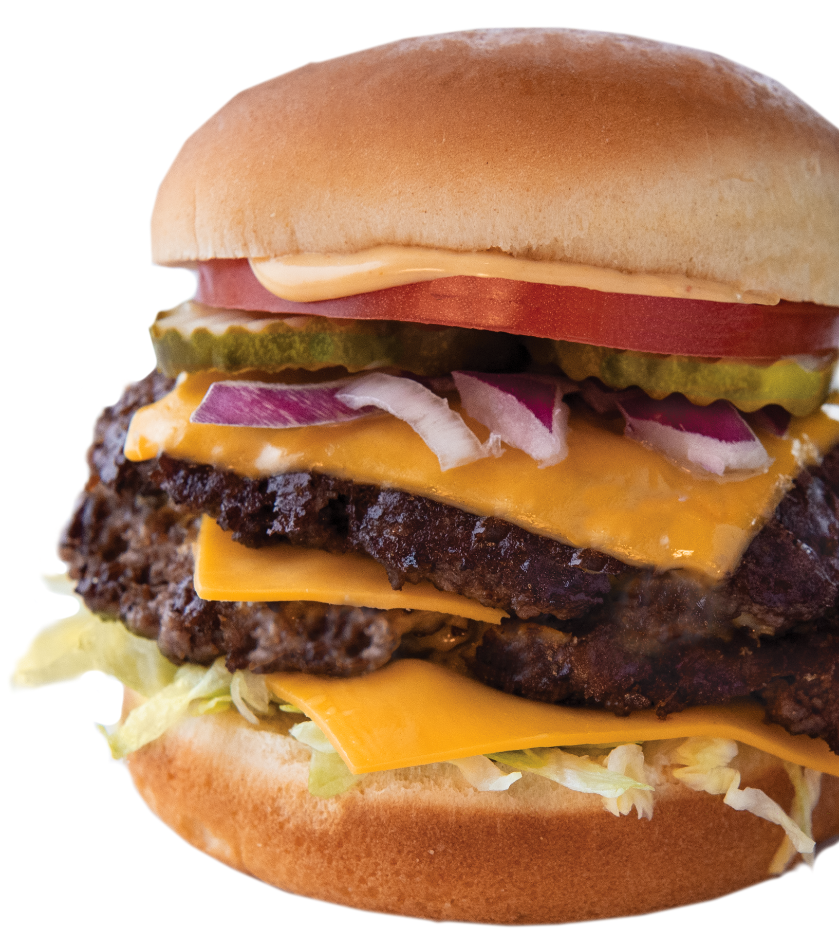 A double cheeseburger with lettuce tomato onions and pickles