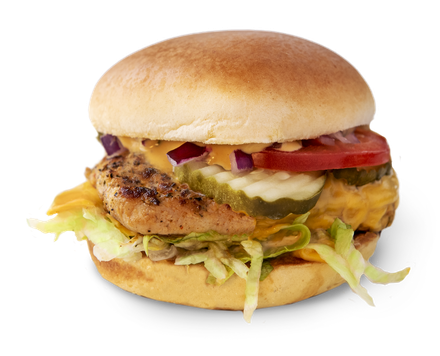 A chicken sandwich with lettuce tomato and pickles on a bun