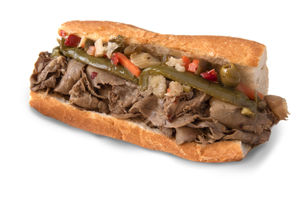 A sub sandwich with meat and vegetables on a white background