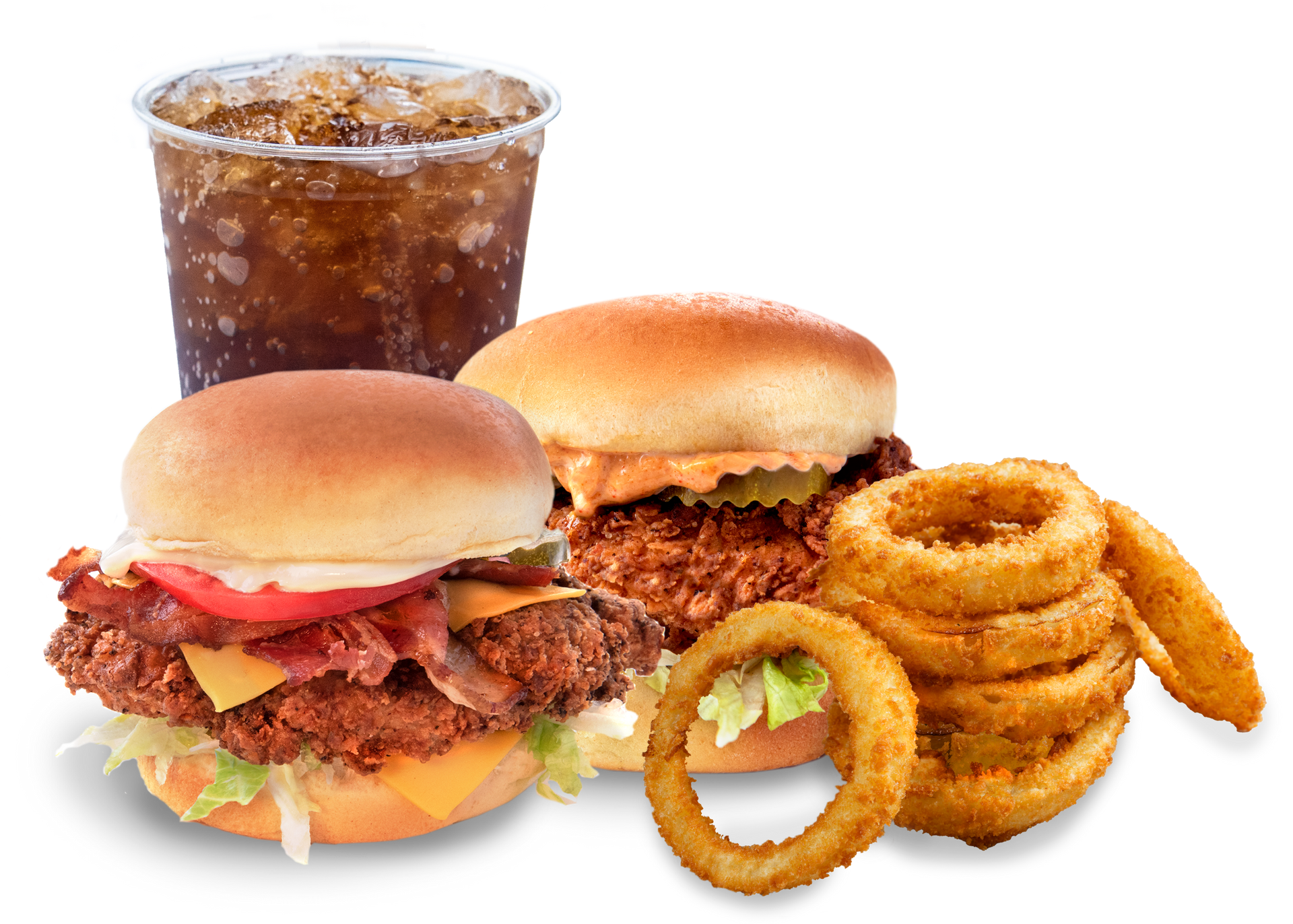 A chicken sandwich onion rings and a drink on a white background