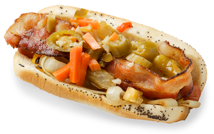 A hot dog with bacon and vegetables on a bun