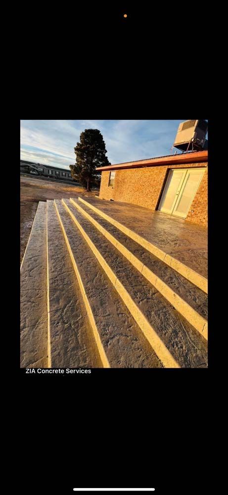A picture of a set of stairs with yellow lines on them.