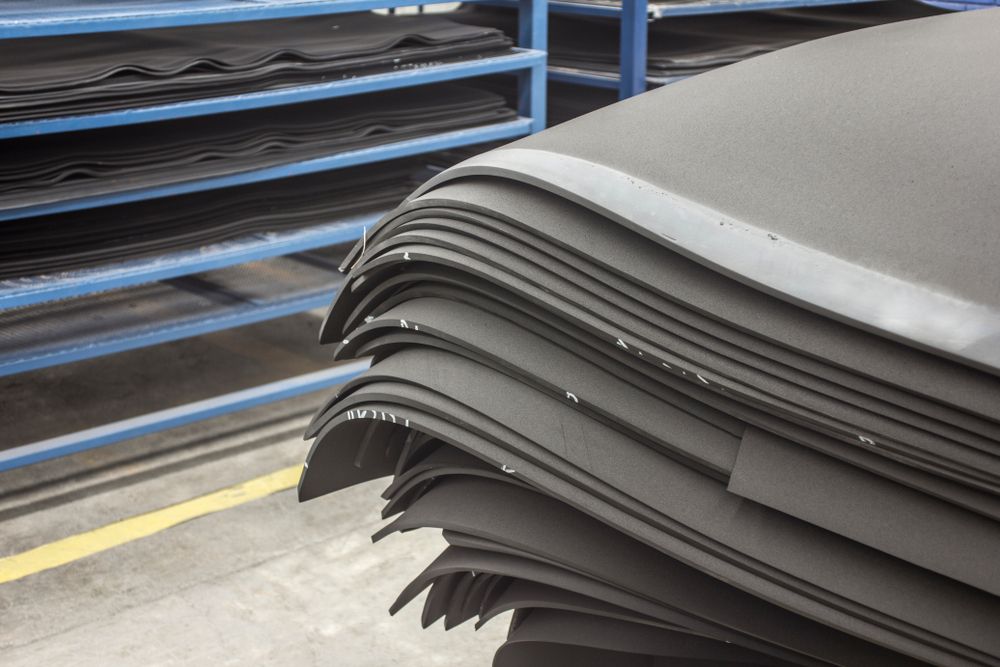 A Stack of Black Foam Sheets in a Factory — F.R.I. Foam & Rubber Industries In Gympie, QLD