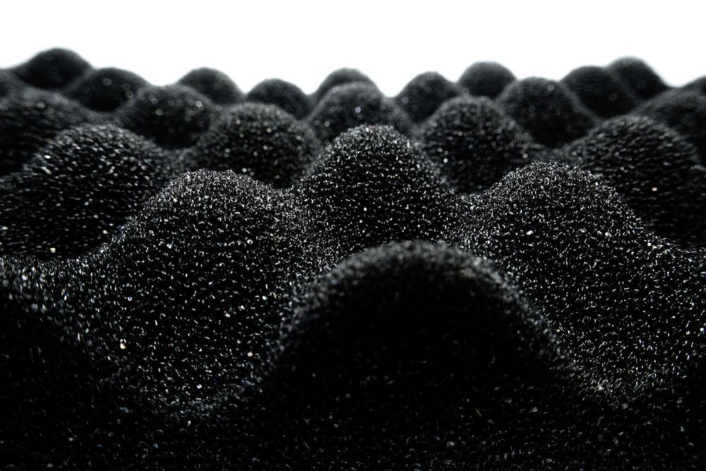 A Close Up of a Black Foam Cushion on a White Background — F.R.I. Foam & Rubber Industries In Gympie, QLD