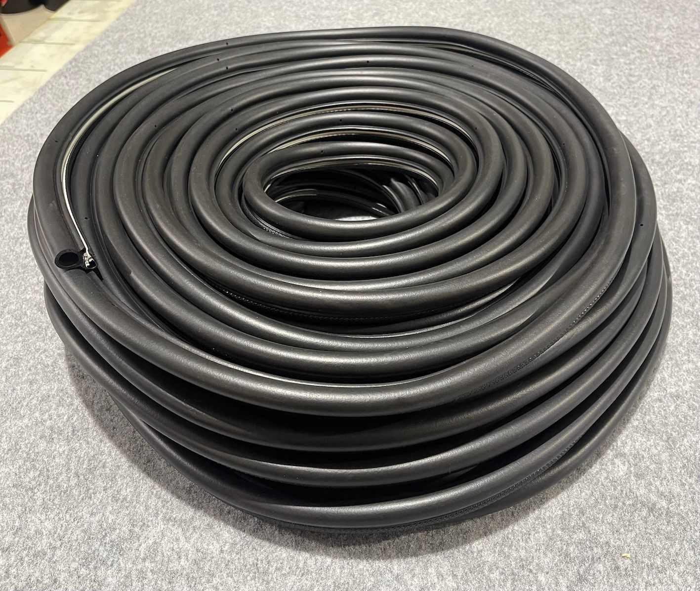Black Round Rubber Extrusion In A Coil.