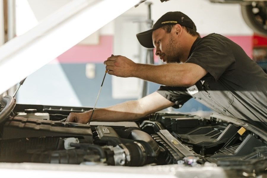 Technician Working on Vehicle