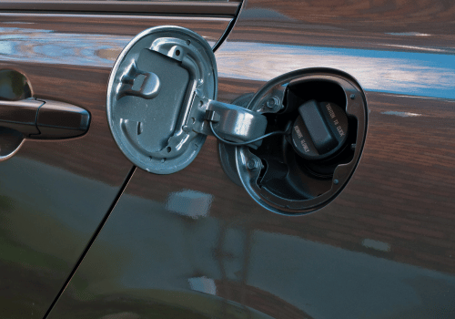 Open vehicle fuel door and gas cap during fuel system inspection and repair