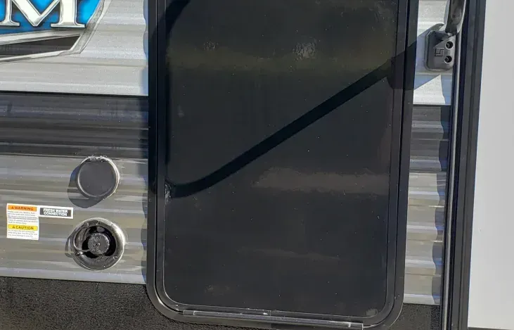A close up of a door on a trailer.