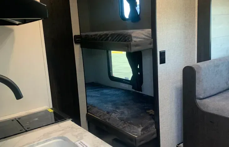 There is a bunk bed in the back of the trailer.