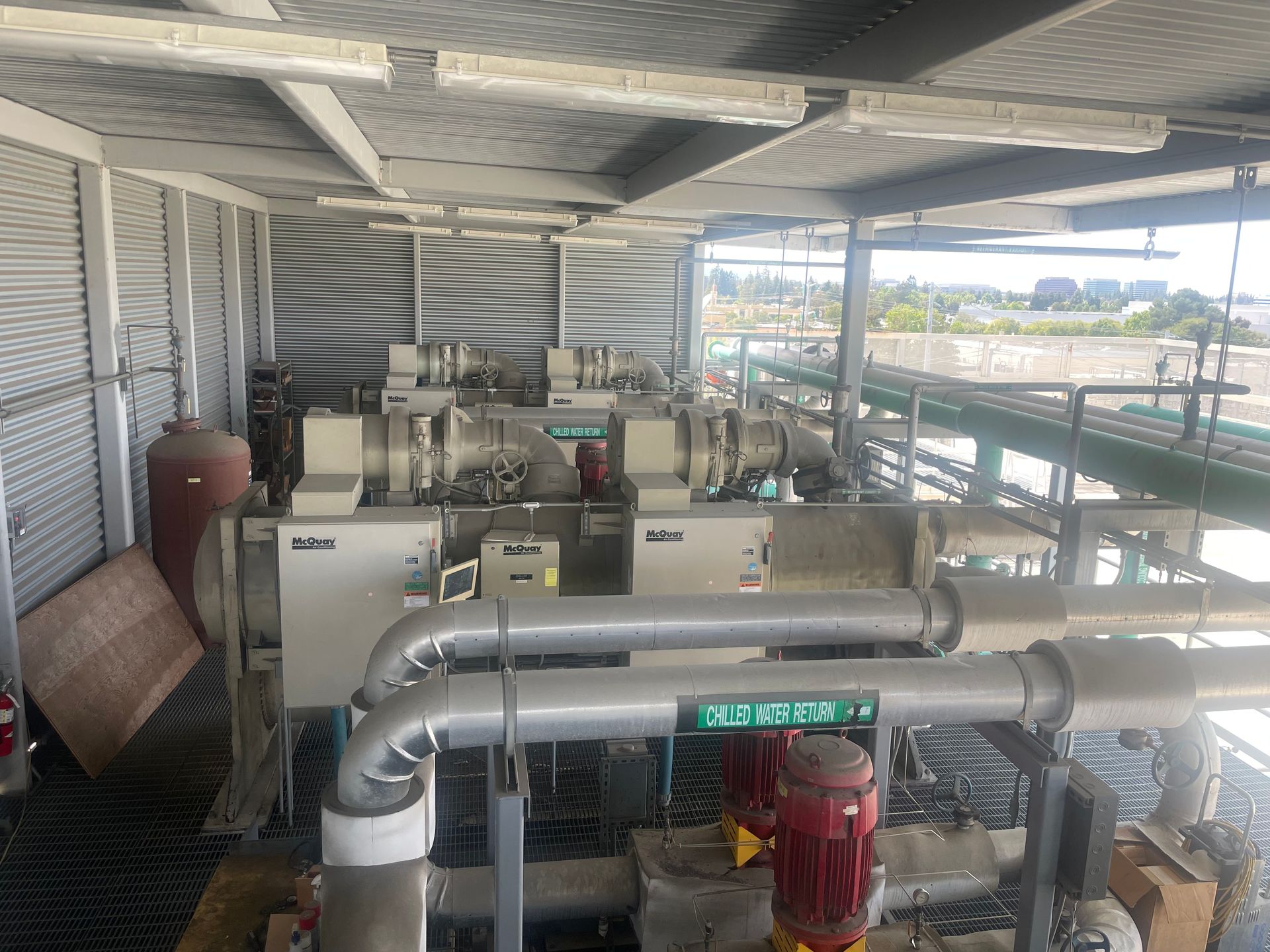 A large room filled with lots of pipes and machinery.