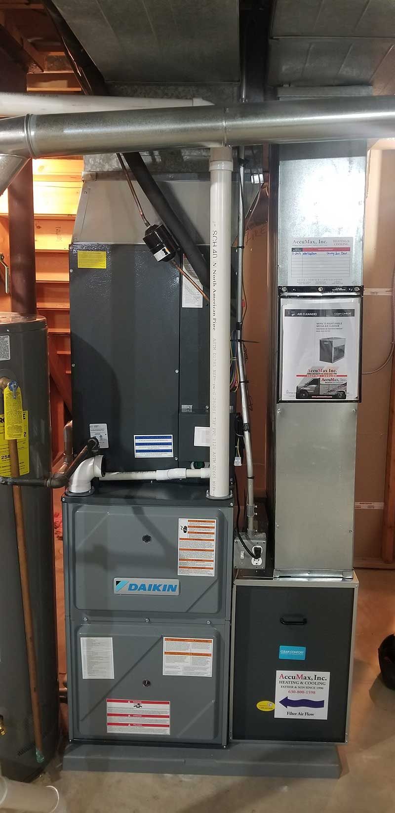 A heating and air conditioning system is installed in a basement.