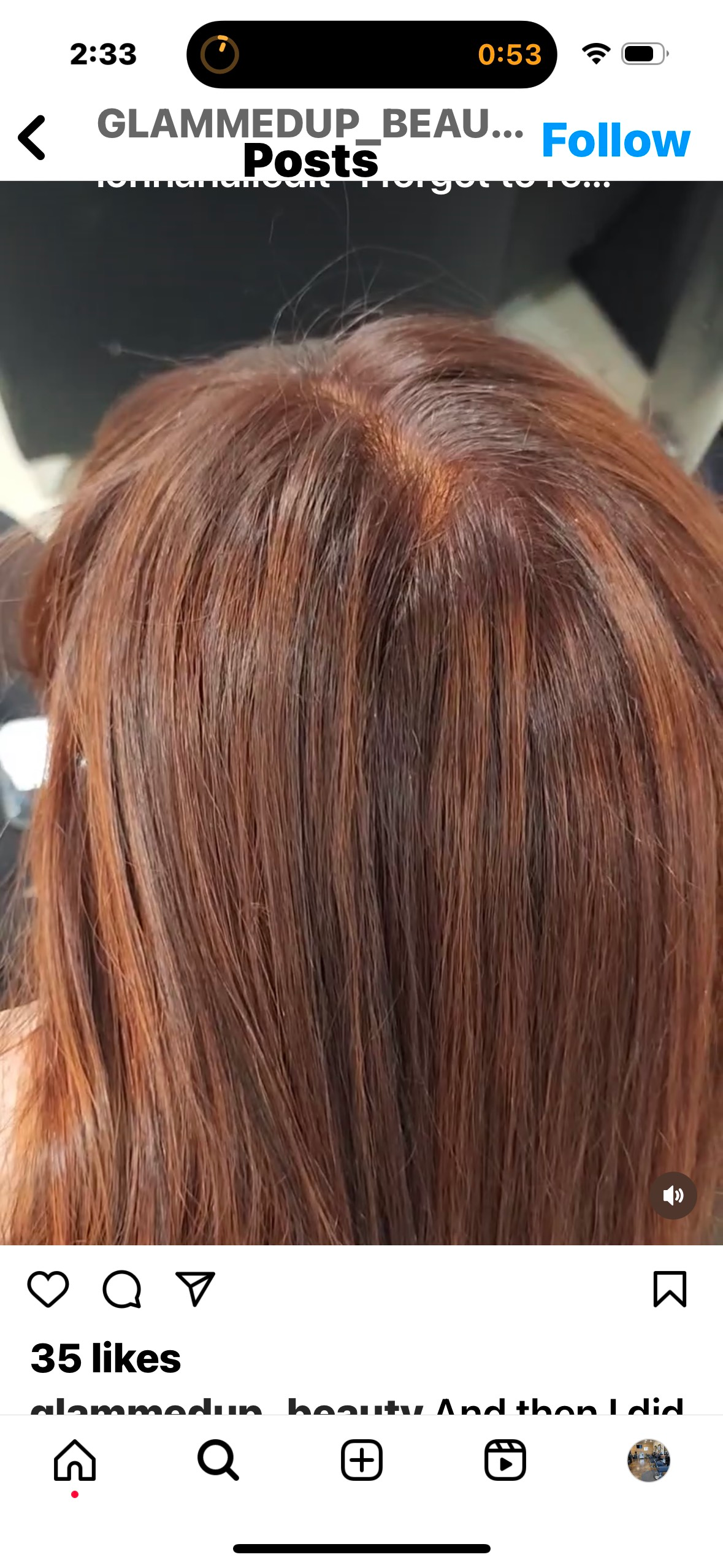 Person with red hair, viewed from the back. The hair is straight and parted in the middle.