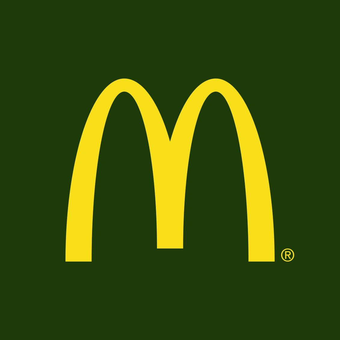 Un logo McDonald's jaune sur fond vert