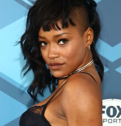 womain with short hair and bangs