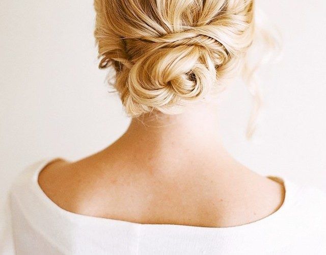 womain with blonde hair in a updo