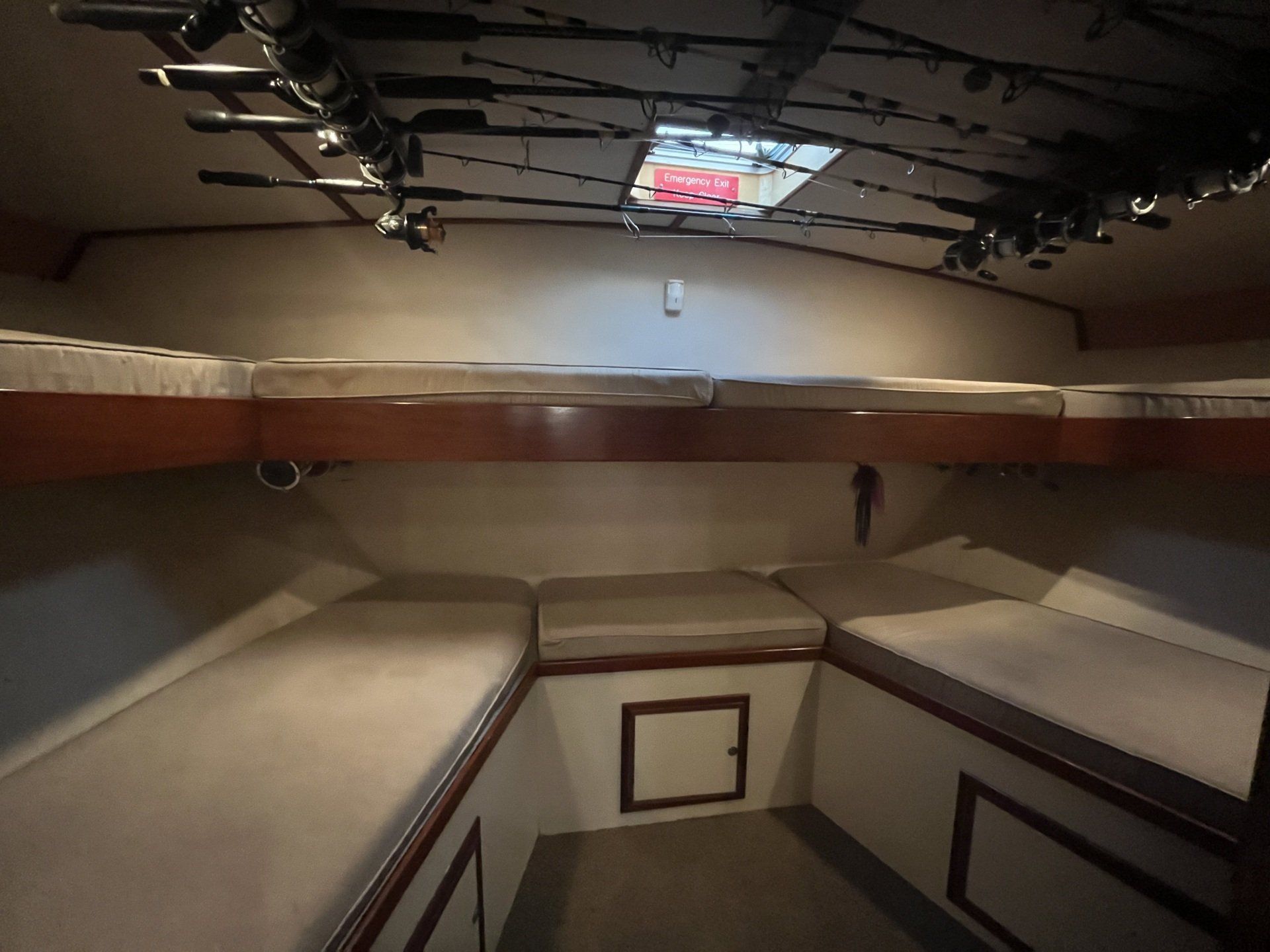 Fishing Destin, FL | Destin Harbor | Charter Boat Relentless | www.charterboatrelentless.com | A Luxury Charter Boat at Everyday Rates | 65' x 20' | V-Berths with Fishing Rods Hanging from the Ceiling