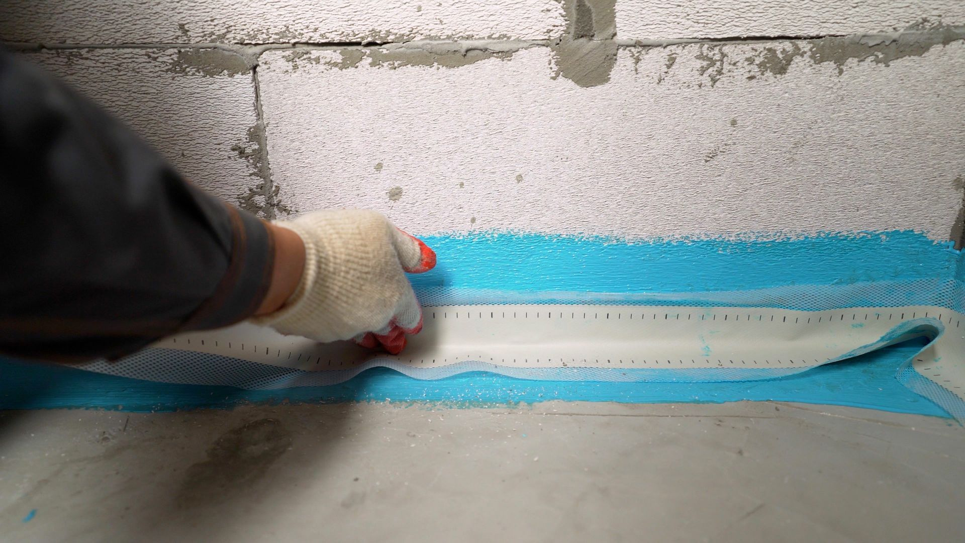 Advanced Basement Waterproofing sealing wall crack leaking water.