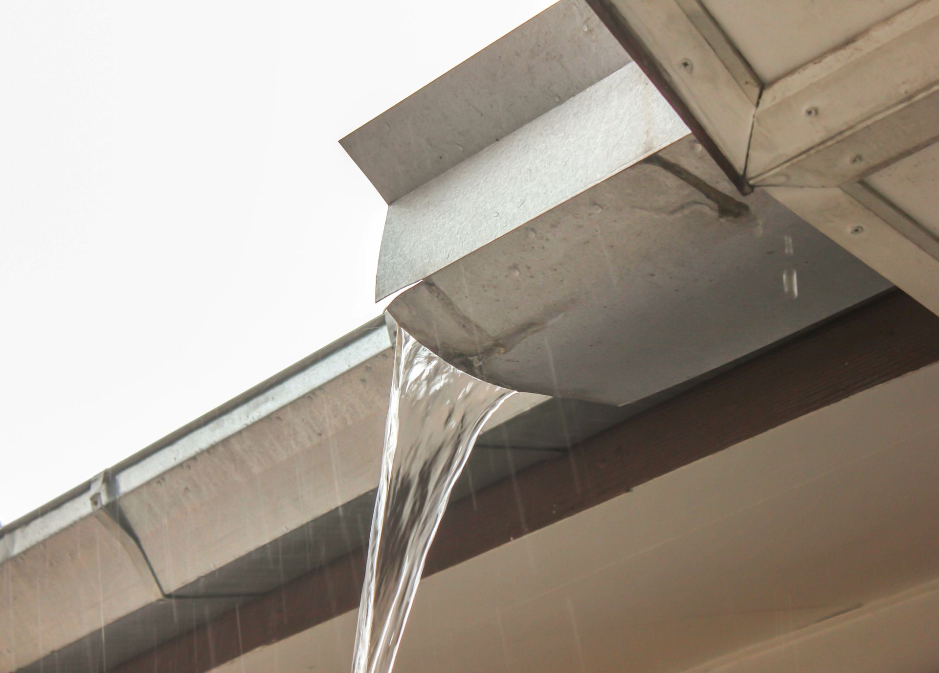 clogged or damaged gutters causing leaks in basements