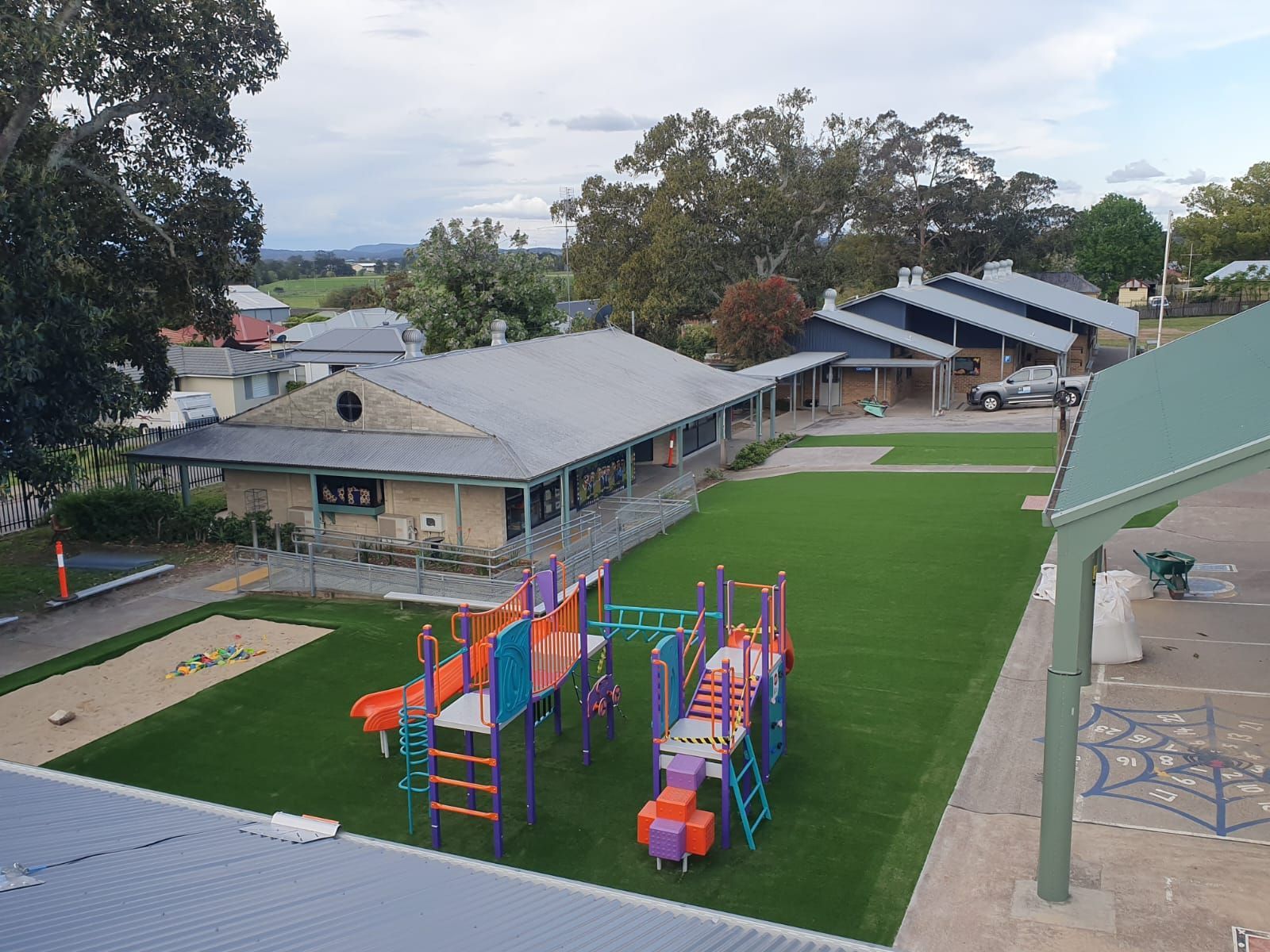 An aerial view of a playground in a school yard