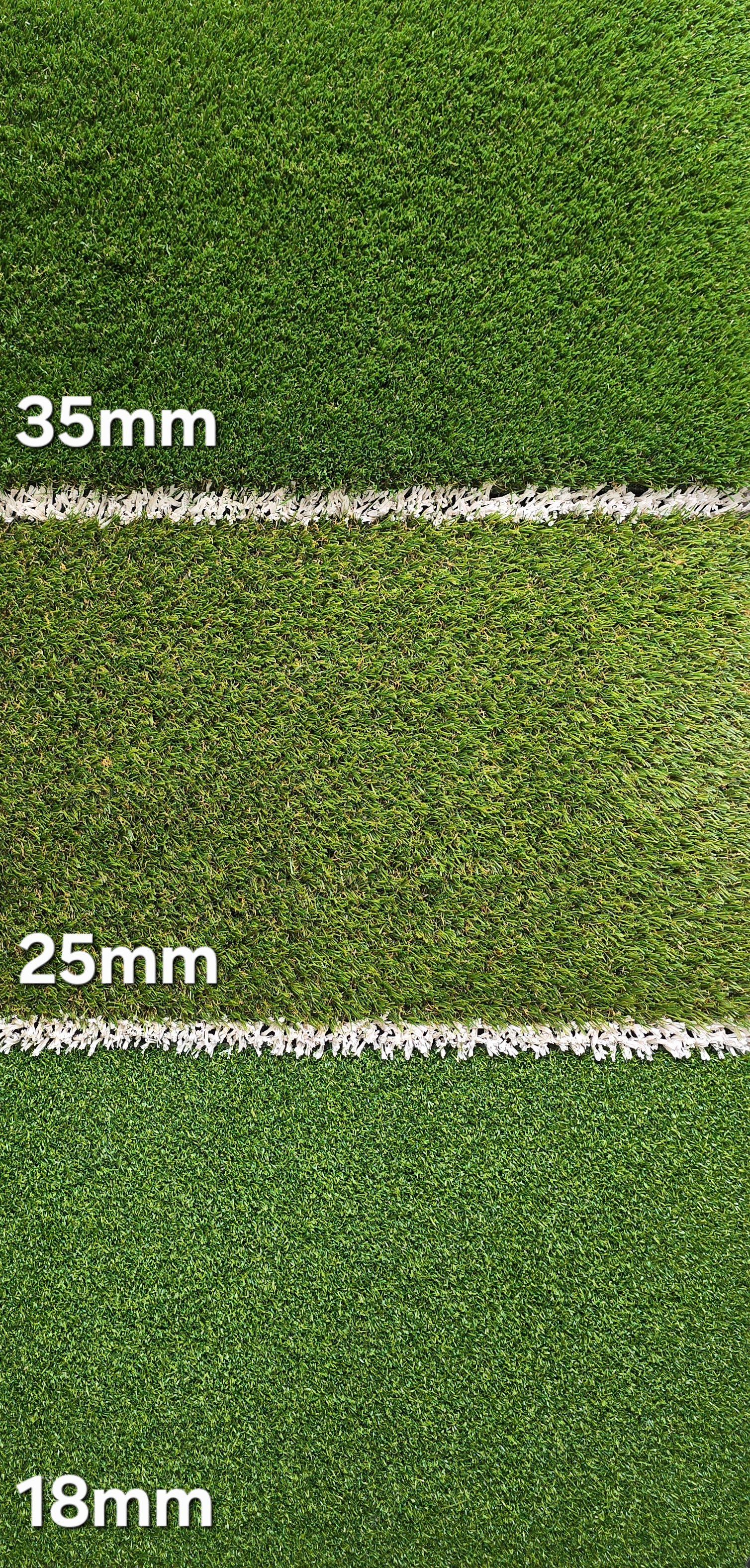 A close up of a green carpet with a white line on it.