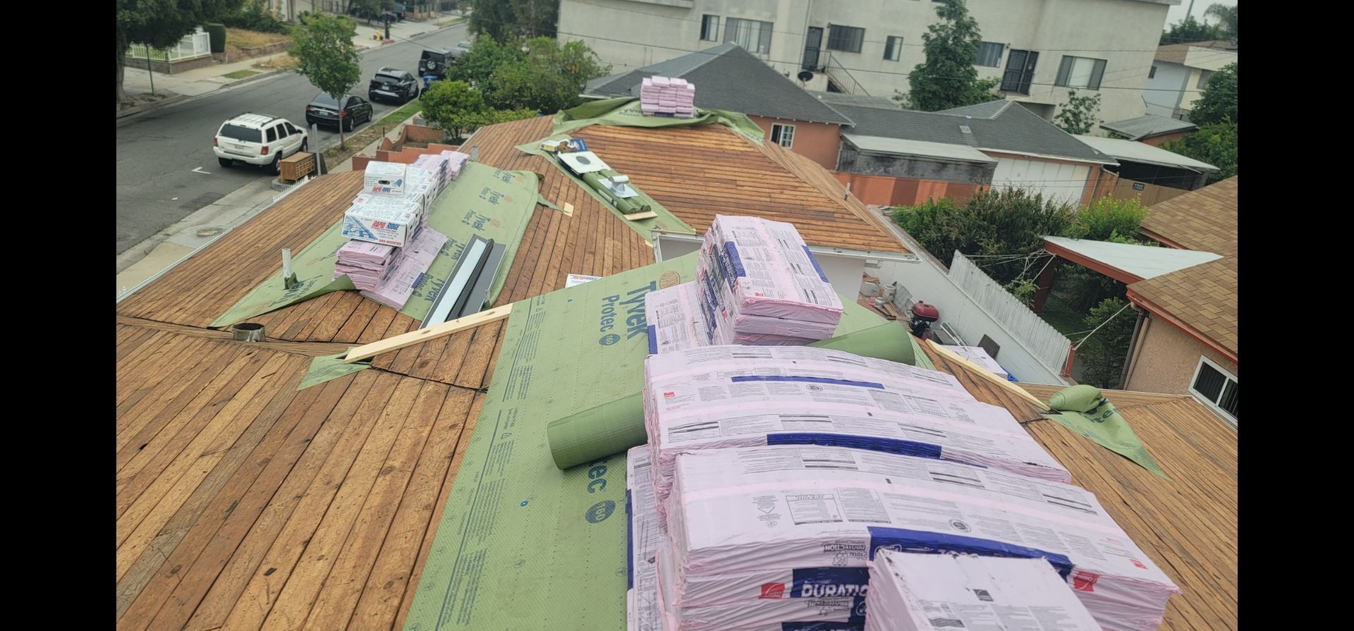 Roofing materials on a house roof during construction.