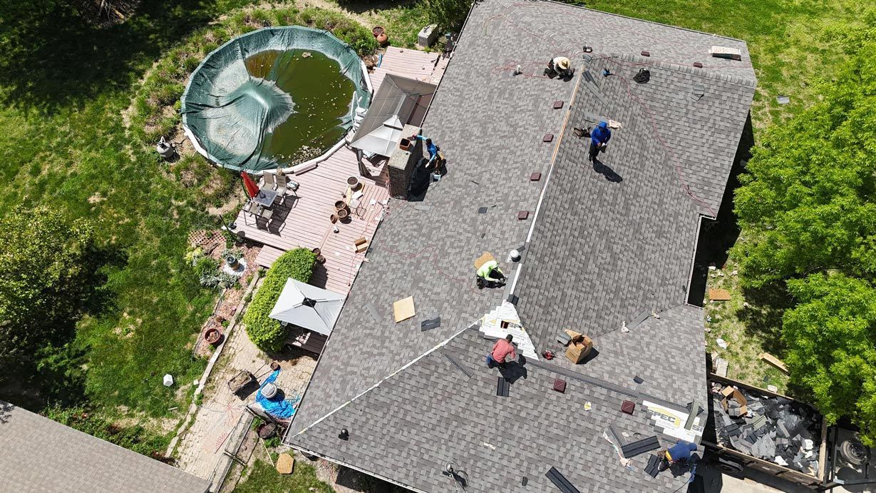 Men Installing New Roof — Lockwood, MO — Johnson Brothers Roofing