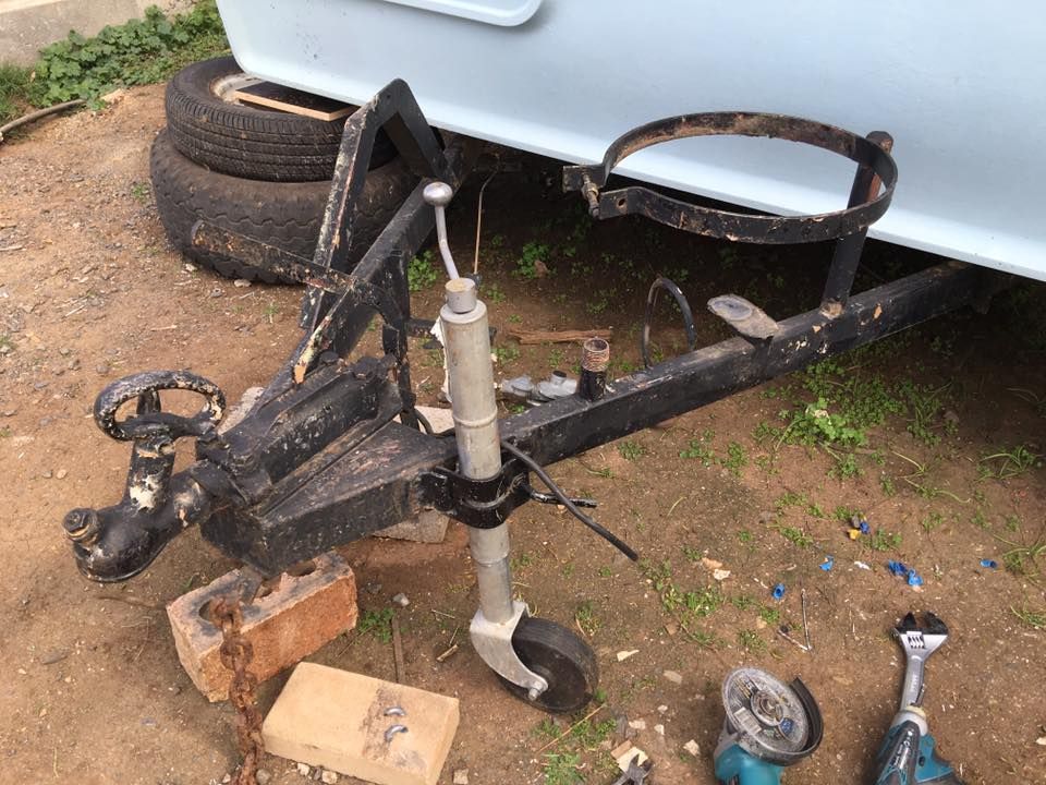 Black Trailer Hitch With a Jack — Andy's Caravan Repairs in Harristown, QLD