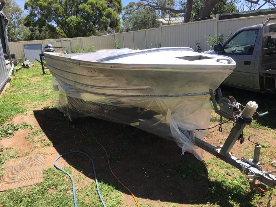 Aluminum Boat on a Trailer — Andy's Caravan Repairs in Harristown, QLD