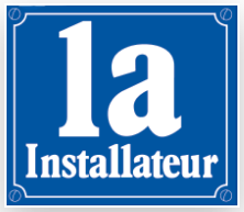 Ein blaues Schild mit der Aufschrift „1a Installateur“