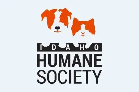Logo of the Idaho Humane Society featuring a stylized orange and white dog and cat above the organization's name.