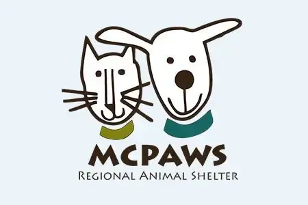 Logo of McPAWS Regional Animal Shelter: cat and dog heads, teal collars, text below.
