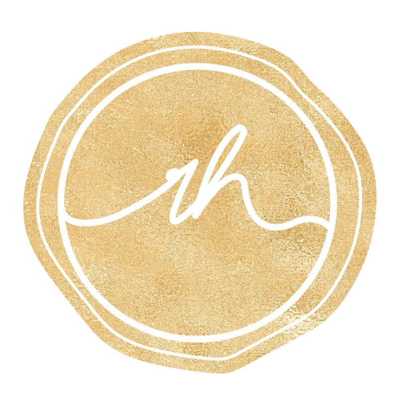 Gold-textured circle with white handwritten 